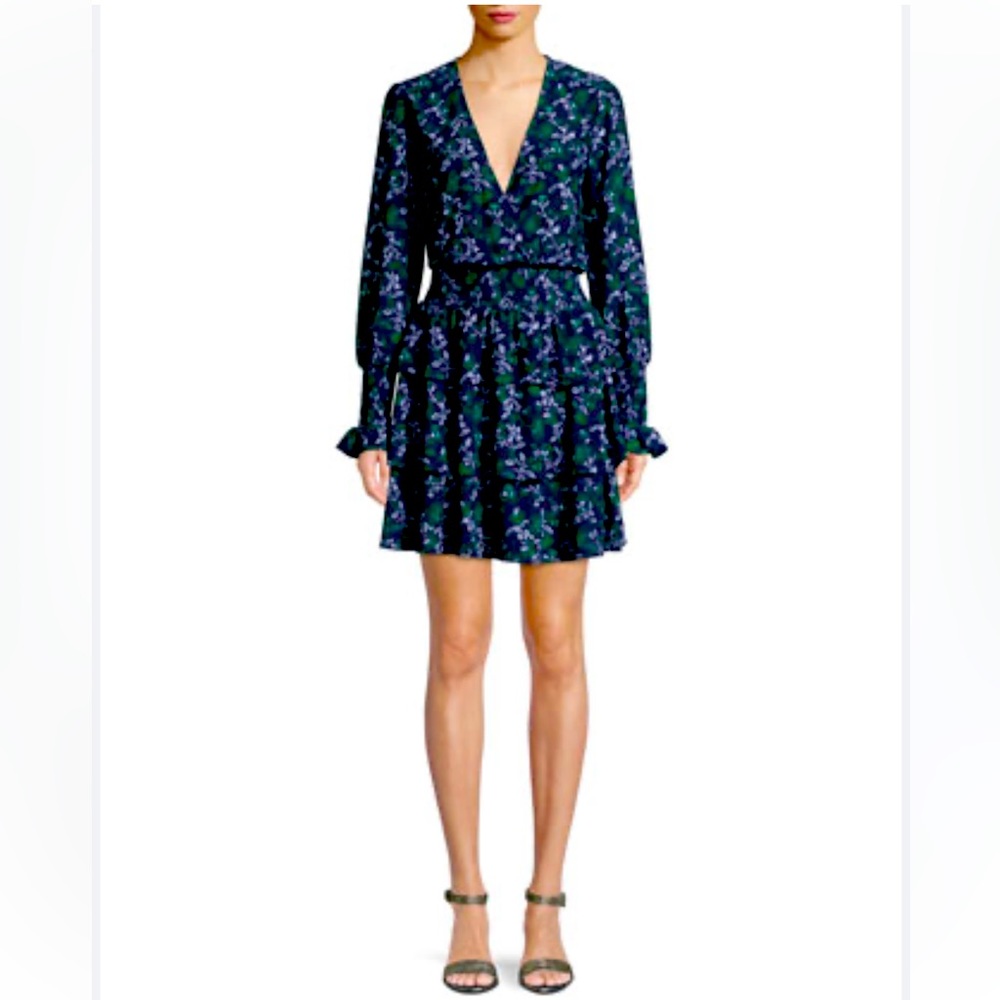 Long sleeve layered dress with floral print. Navy blue, green, and white.